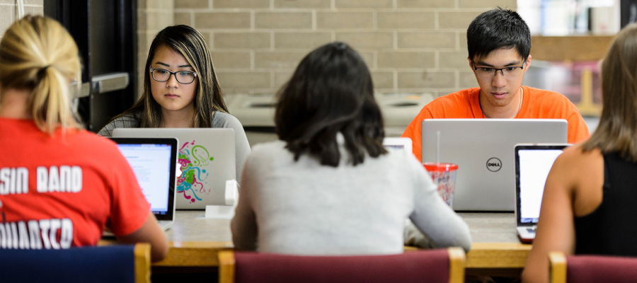 Students studying at College Library