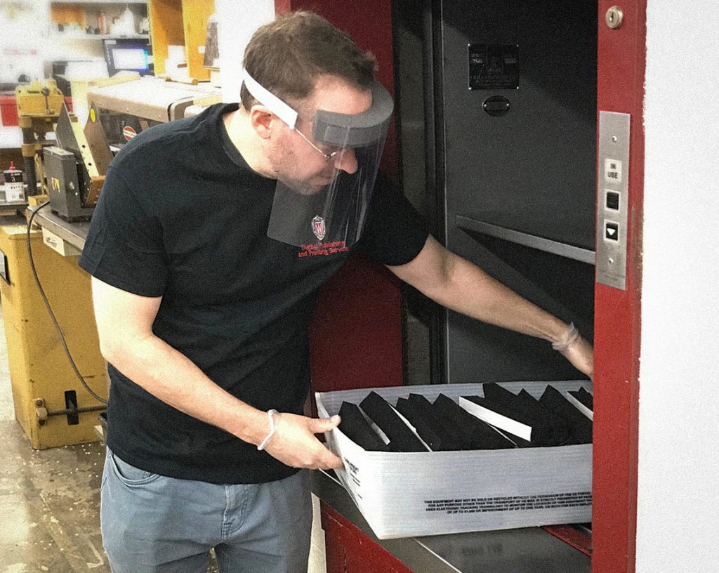 Getting face shield materials from a dumbwaiter