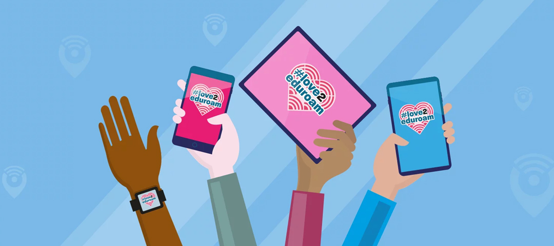 Hands holding mobile devices and a smartwatch displaying the #love2eduroam heart logo.