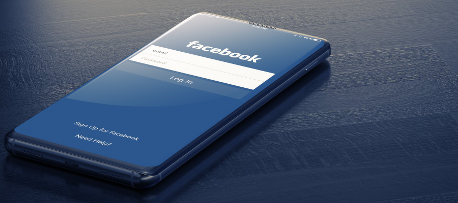 Cellphone with Facebook log in screen displayed