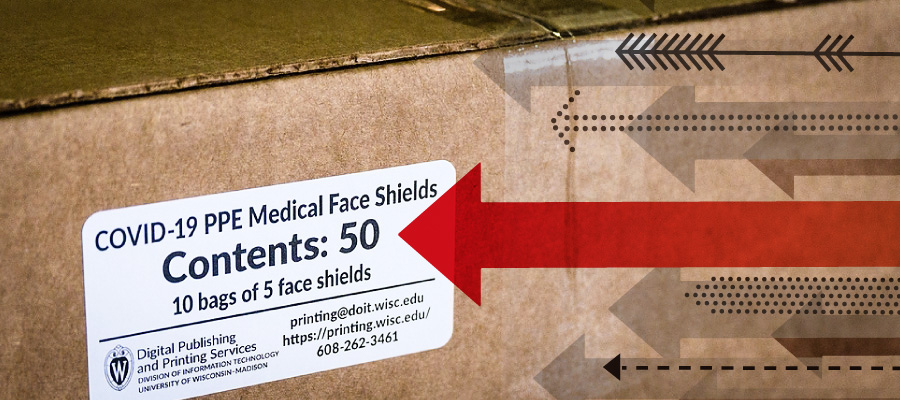 Box containing face shields