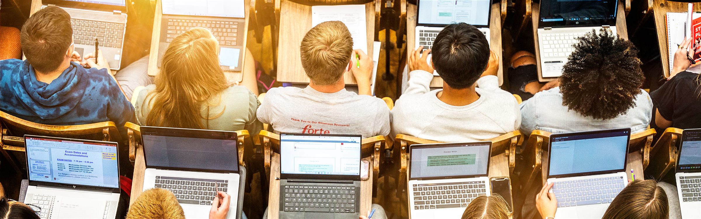 Students in class with laptops