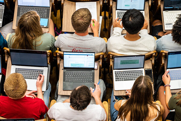 Students in class with laptops
