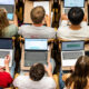 Students in class with laptops