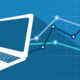 Laptop and an abstract of a line chart on a blue background.