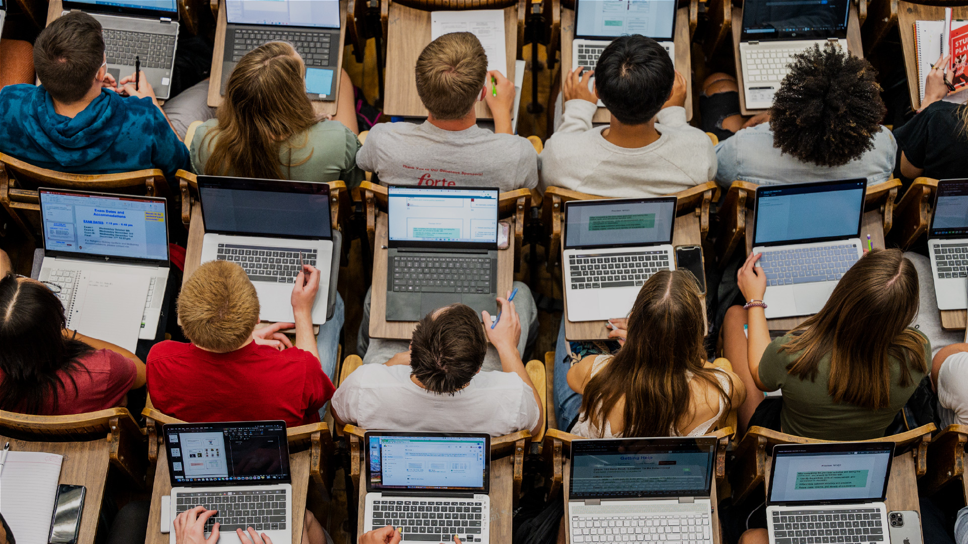 Students in class with laptops