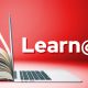 Learn@UW with a book and laptop merged together
