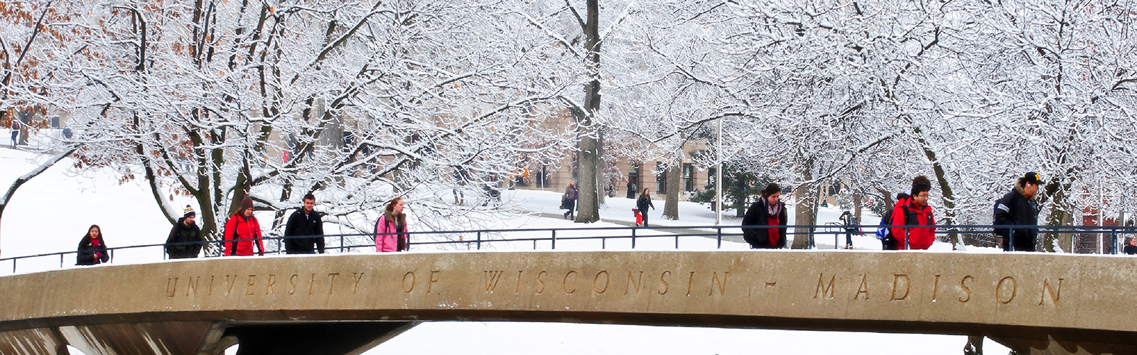 Park Street bridge in the winter with pedestrians crossing it