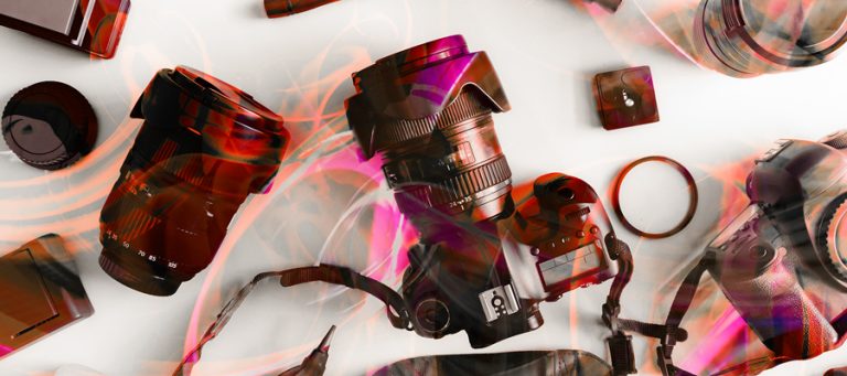 A set of professional camera equipment with a color light drawing overlaid