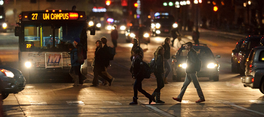 A busy UW–Madison street at night.