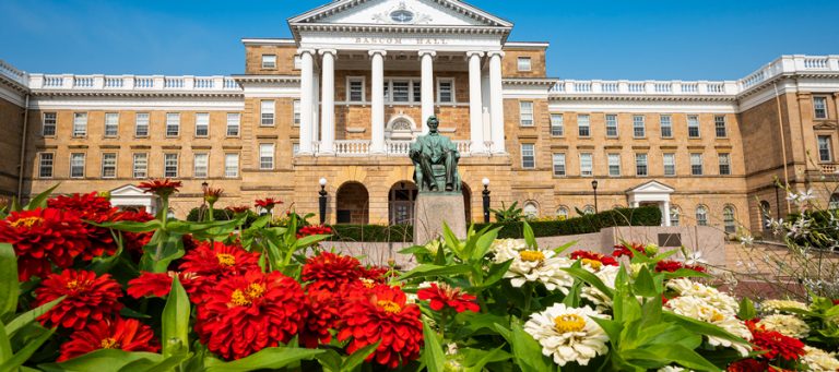 Bascom Hall with Zinnia flower blooms