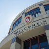 Entrance of building that says Wisconsin School of Business.