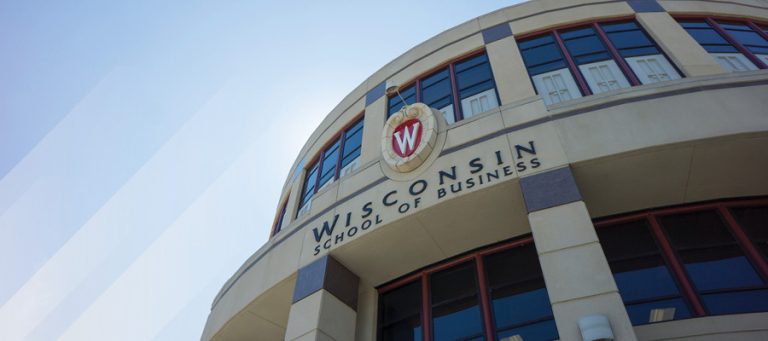 Entrance of building that says Wisconsin School of Business.