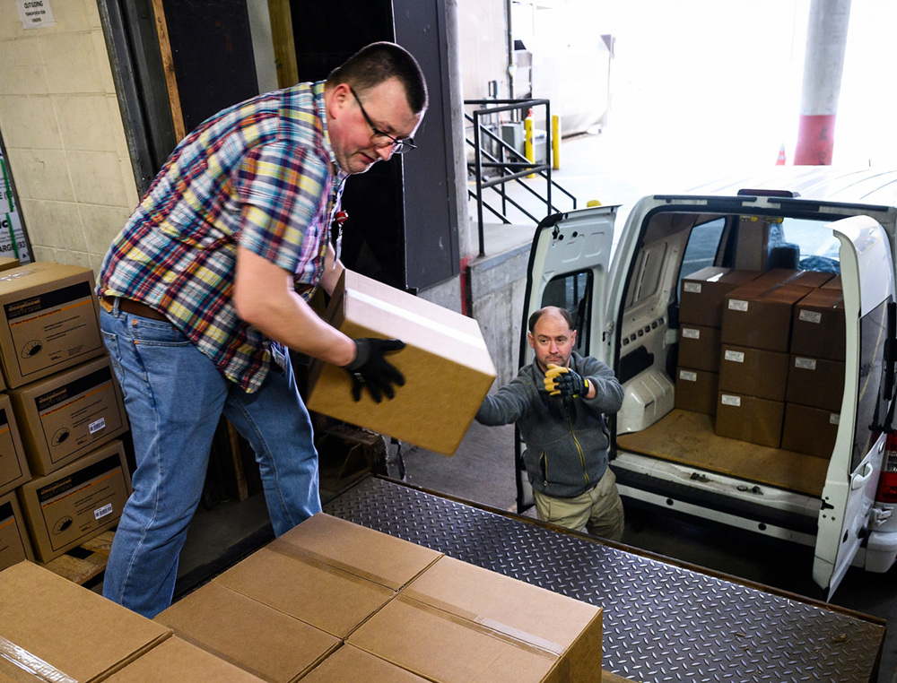 Loading a shipment of face shields