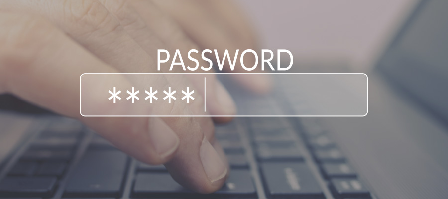 Password field superimposed over hands on a keyboard