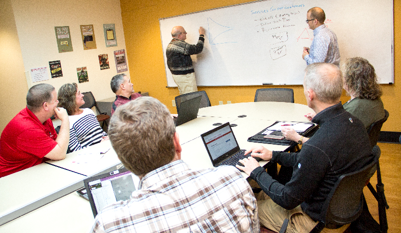 Photo of team working together